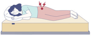 woman sleeping on her side with hip pain
